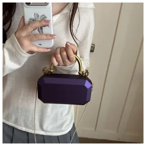 Purple acrylic box bag with gold handle and chain strap for evening party and daily wear.