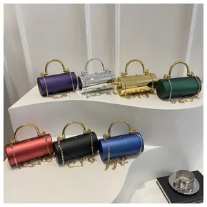 Borsa da sera cilindrica in acrilico con manico in metallo e catena per la moda.