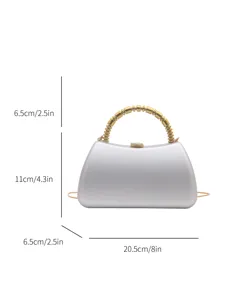 Silver hard shell evening clutch bag detail showing dimensions, golden beaded handle.
