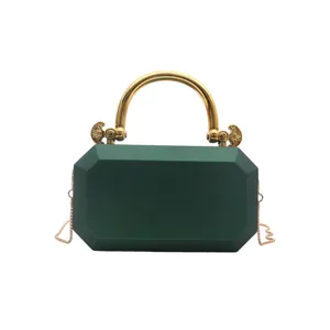 Green acrylic box clutch bag with gold handle and chain strap for women evening party.