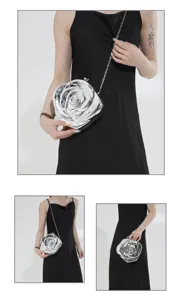 Detailed view of a silver rose flower acrylic evening bag with metal chain strap worn.