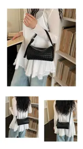 Black woven leather cylinder shoulder bag stylish minimalist crossbody handbag for women daily wear