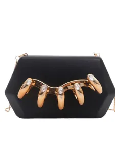 Black acrylic knuckle clutch bag with chain strap, stylish rhinestone evening bag for women.