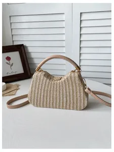 Sac bandoulière élégant en paille tissée avec poignée, idéal pour les vacances à la plage et l'été.