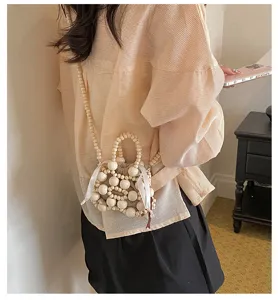 Bolso cruzado mini de cuentas hecho a mano con diseño tejido único, accesorio de verano.
