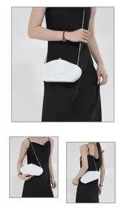Detail view of white acrylic shell clutch bag with metal chain strap, fashionable evening bag.