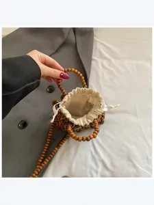 Bolso de mano mini con cuentas hechas a mano, elegante bolso bombonera cruzado para verano.