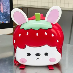 Cute strawberry cartoon EVA backpack detail, lightweight children school bag, front view.