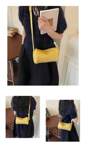 Stylish yellow woven cylinder shoulder bag for women, featuring a chic crossbody design.