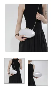 Borsa da sera ovale in acrilico con tracolla a catena, ideale per feste estive eleganti.