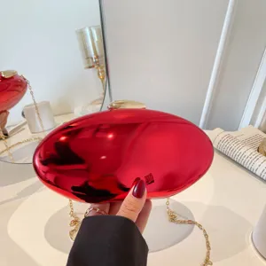 Borsa a pochette ovale in acrilico rosso con catena dorata da donna elegante borsetta.