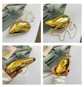 Goldene, mangoförmige, metallische Hartschalen-Abendtasche mit Kette, stilvolle Handtasche Detail