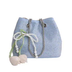 Light blue rhinestone bucket bag with metallic chain strap and stylish pearl tulip pendant.