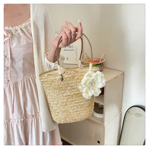Summer natural straw woven handbag with elegant flower decor, casual beach tote bag for women.