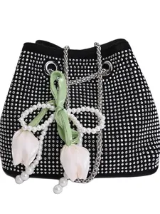 Rhinestone chain bucket bag for women, stylish black crystal shoulder bag with pearl tulip decor.