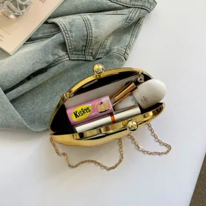 Goldene Metall Hartschalen Abendtasche, stylische Mango Clutch mit Kette für Damen.
