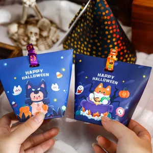 Halloween candy gift boxes, cute cartoon paper treat boxes with ribbons for party decor.