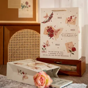 Rose gift bag with butterfly illustration, vintage paper bag for Valentine Day packing.