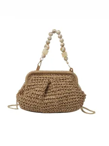 Woven straw handbag with beaded handle and gold chain strap, elegant summer beach shoulder bag.