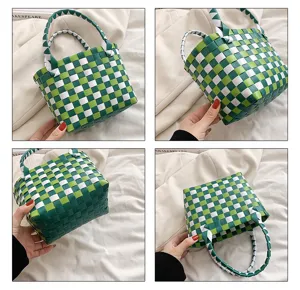Handcrafted green and white checkered woven beach bag detail view showing fine handmade texture.
