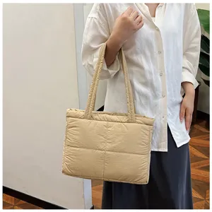 Quilted puffer tote bag for women, soft padded single shoulder bag, casual commuting bag.