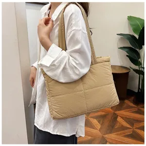 Casual quilted shoulder bag for women, trendy puffer underarm bag, soft daily commute tote.