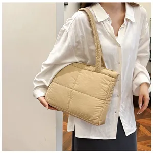 Beige quilted shoulder puffer bag, minimalist autumn winter women commuting underarm handbag.