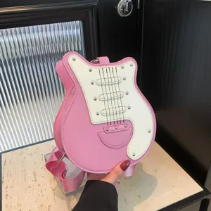 Chic pink guitar shaped crossbody bag for women, creative PU leather purse with wide strap.