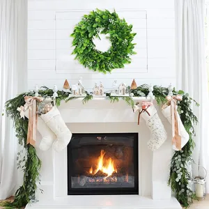 Artificial green leaf wreath for front door decor, farmhouse rustic wall hanging for home interior.