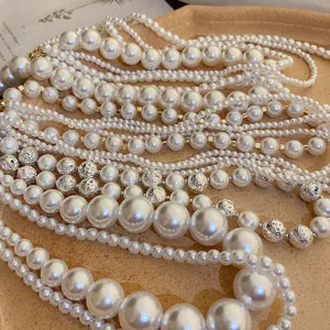 French vintage multi-strand pearl necklace, elegant textured bead design for women.