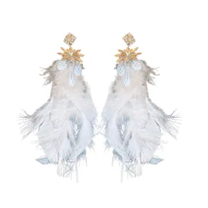 Élégantes boucles d'oreilles à pampilles en plumes et cristaux, bijoux pour femmes.