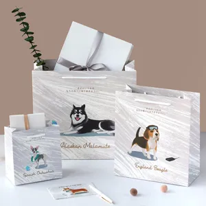 Kreative minimalistische Papiertragetaschen mit süßen Hundemotiven für Feste und Geschenke