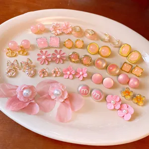 Pink sweet style pearl flower stud earrings set, cute bow and letter fashion jewelry for women.