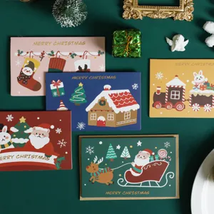 Süße Cartoon Weihnachts-Grußkarten mit Goldfolien-Design, ideale festliche Glückwunschkarten.