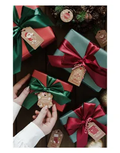 Christmas kraft paper tags gift wrapping set decorative cards with strings for holiday gifts.