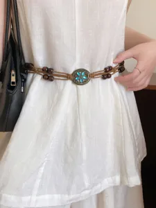 Bohemian braided waist chain retro ethnic belt with wooden beads and blue gem flower centerpiece.