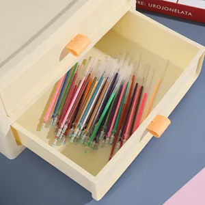 Colorful gel pen refills set in a beige desktop storage drawer for DIY crafting and daily note.