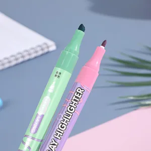 Dual-tip stackable highlighter detail shot showing colorful marker pens for student study notes.