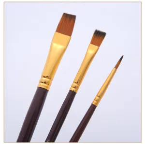 Detail shot of artist paint brush set bristles metal ferrule and handle for fine art painting.