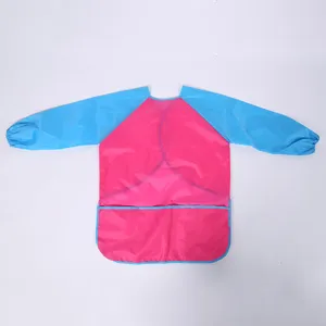 Kids waterproof art smock with long sleeves and front pockets for painting, crafting and school.
