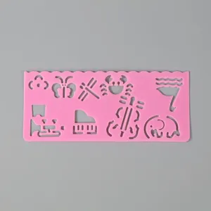 Multi-functional pink plastic drawing stencil ruler with cute animal and instrument cutouts for kids.