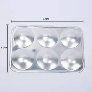 Detail view of the 6-hole aluminum mixing palette tray, showing metallic texture and durable build.