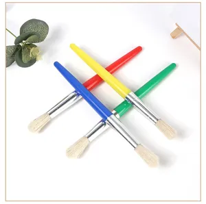 Detailed shot of four colorful plastic handle paintbrushes with soft bristles and metal ferrule.
