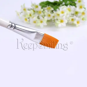 Detailed close-up of a flat art paint brush with orange bristles and white handle.
