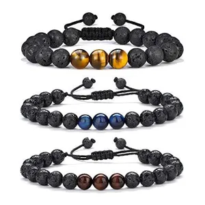 Close-up detail of natural lava stone and multi-color tiger's eye beaded adjustable bracelets.