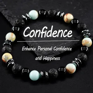 Close-up detail of multi-stone beaded stretch bracelet with natural lava and hematite beads.