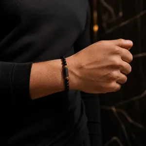 Obsidian beaded bracelet 6mm black tourmaline couple jewelry detail view showing elegant wear.
