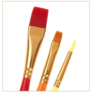 Detailed close-up of nylon paint brushes with colorful handles for kids DIY painting art.