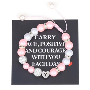 Handmade woven pink and white pearl bracelet with stainless steel heart letter charm.