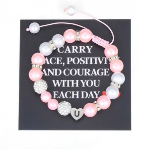 Handmade pink pearl bracelet featuring sparkling rhinestone beads and stainless steel heart charm.
